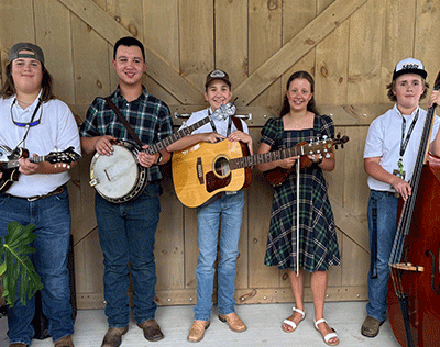 Press photo of Denim & Plaid